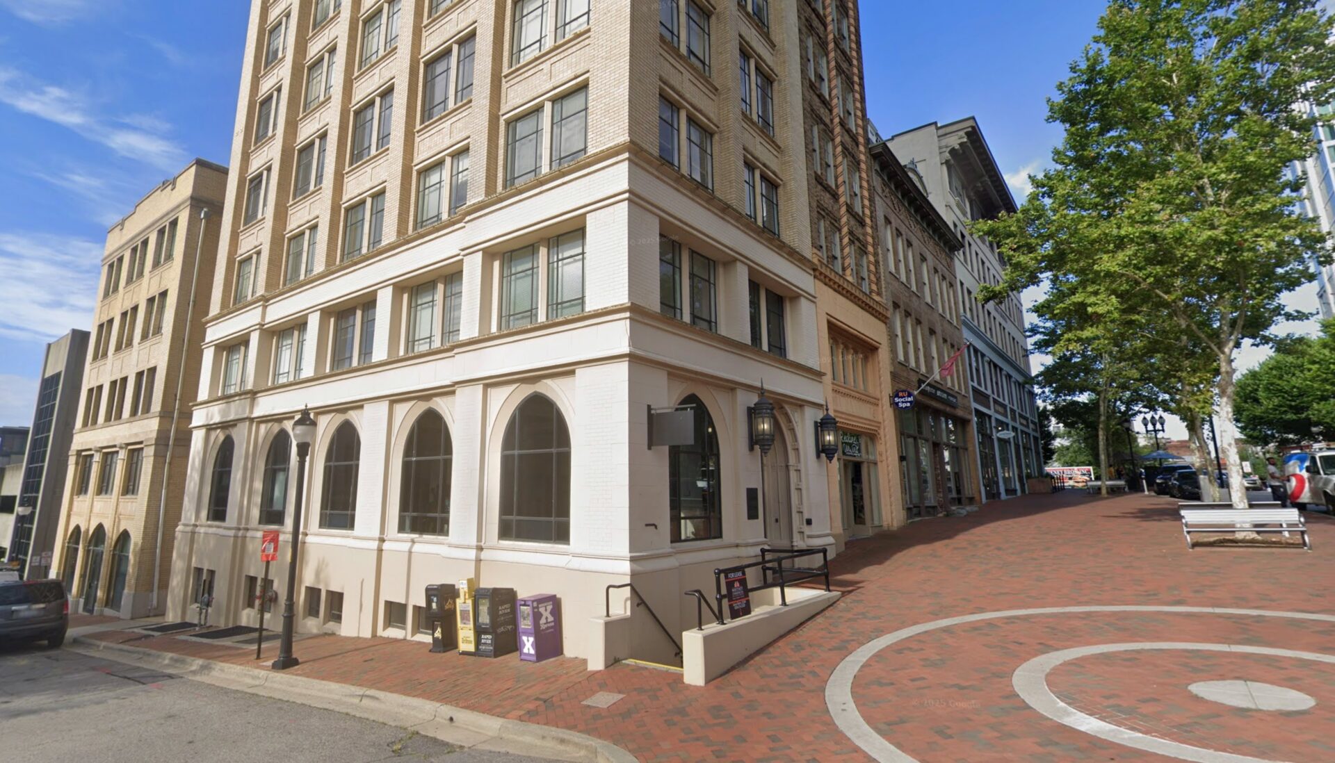 Asheville ascendly marketing office building with brick pathway.
