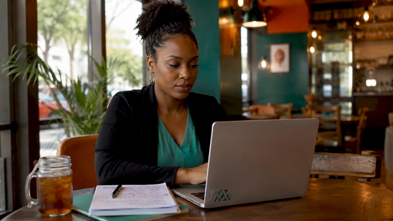 Female marketer working on UX at desk
